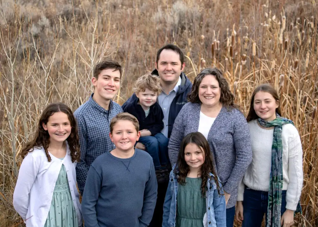 Image of Dr. Josh George, a dentist in Cody, Wyoming, and his family, including his wife and six kids.